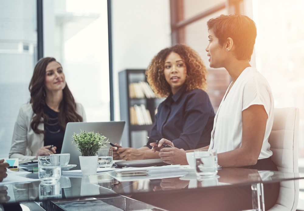 Image: A group of colleagues having a meeting in an office