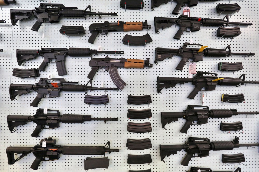 Image: Guns are displayed for sale at Dragonman's, an arms seller east of Colorado Springs