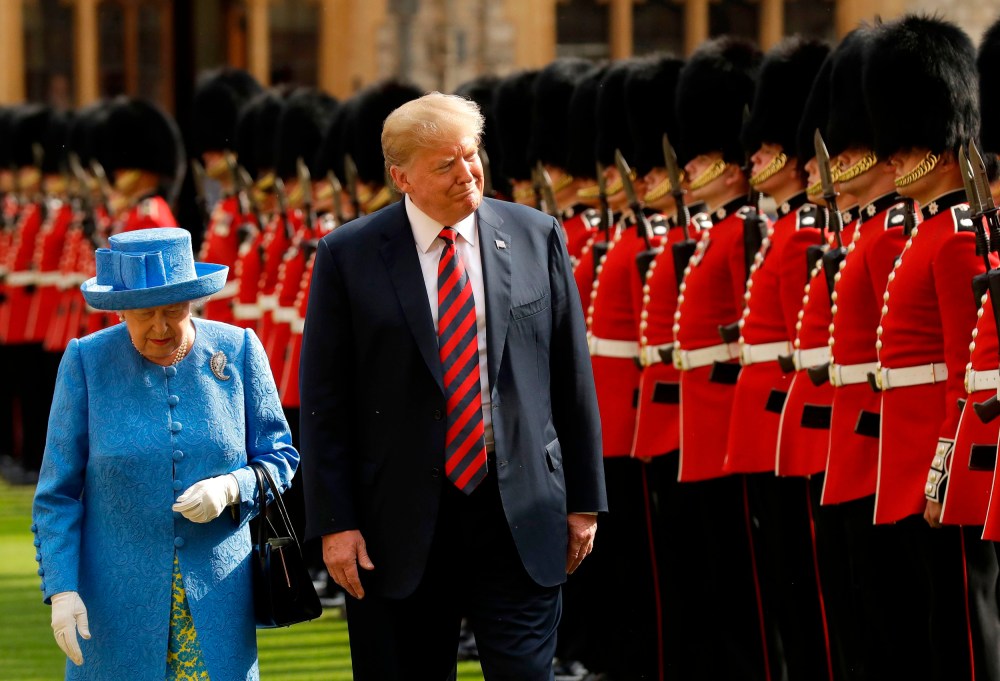 Image: Queen Elizabeth and President Donald Trump inspect the guard of honor at Windsor Castle in England on July 13, 2018.