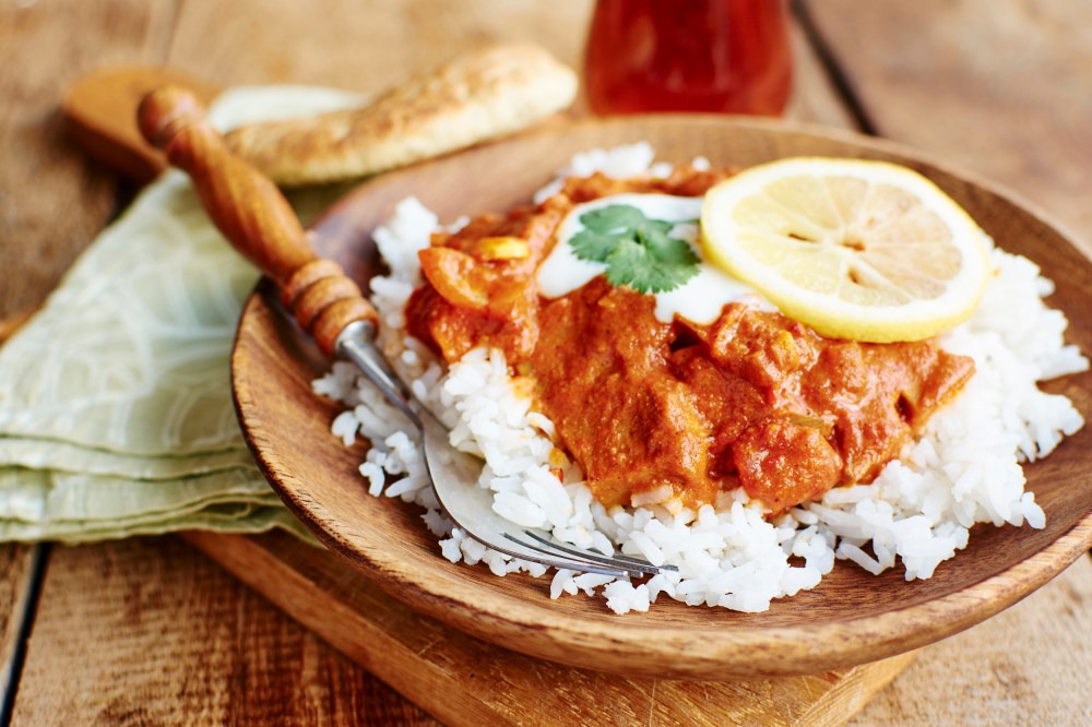 Image: Seitan Tikka Masala on rice with soy yogurt and served with paratha bread