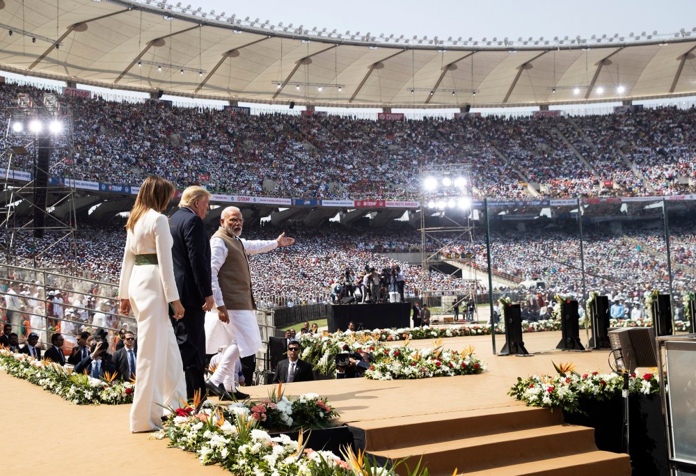 Image: President Donald Trump, first lady Melania Trump, and Indian Prime Minister Narendra Modi arrive for a "Namaste Trump," event at Sardar Patel Stadium,