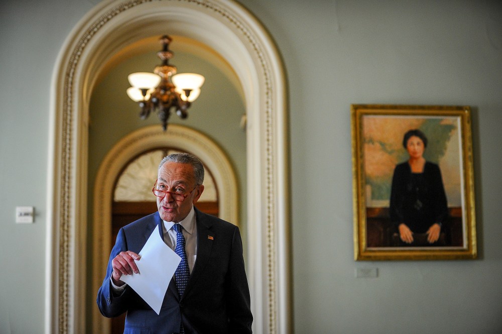 Image: U.S. Senate Minority Leader Chuck Schumer (D-NY) makes a statement after meetings to wrap up work on coronavirus economic aid legislation, during the coronavirus disease (COVID-19) outbreak, in Washington