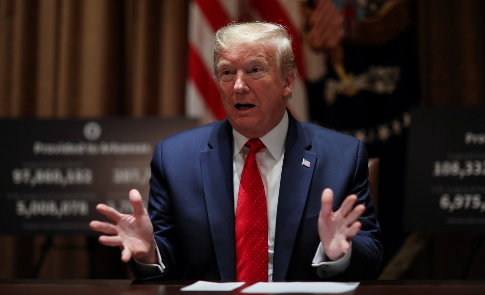 Image: President Donald Trump speaks about the coronavirus disease (COVID-19) pandemic response during a meeting with Kansas Governor Laura Kelly and Arkansas Governor Asa Hutchinson in the Cabinet Room at the White House
