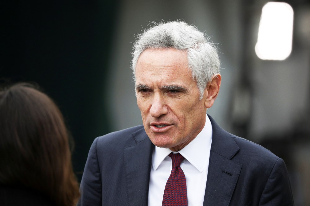 Image: Trump coronavirus disease advisor Dr. Scott Atlas walks outside the White House in Washington