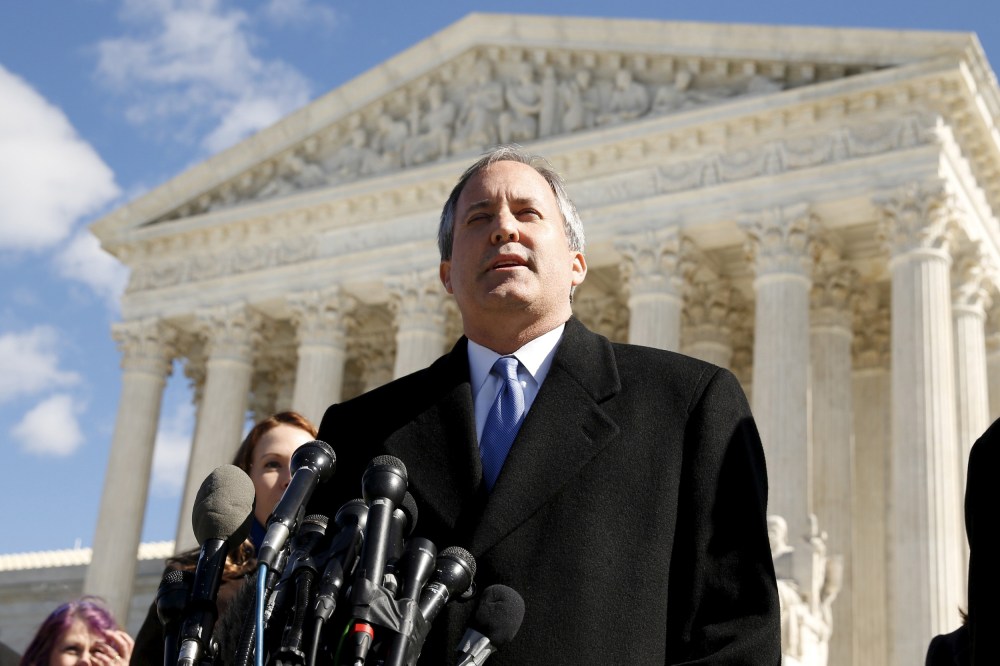 Image: FILE PHOTO: Texas Attorney General Ken Paxton addresses reporters on the steps of the U.S. Supreme Court in Washington