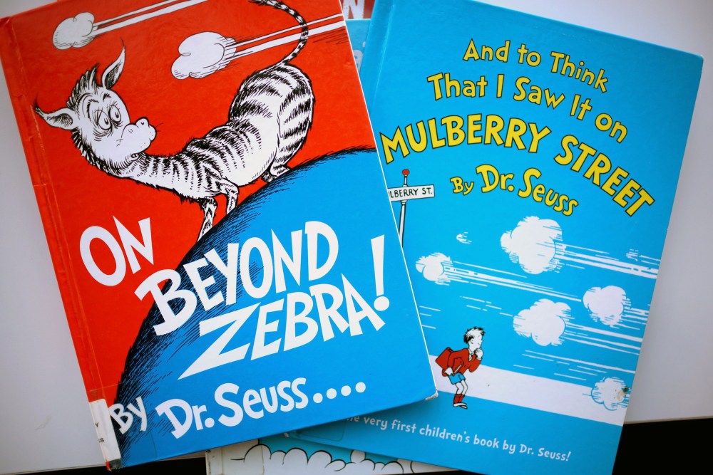 Image: Books by Theodor Seuss Geisel, aka Dr. Seuss, including "On Beyond Zebra!" and "And to Think That I Saw it on Mulberry Street," at the Chinatown Branch of the Chicago Public Library