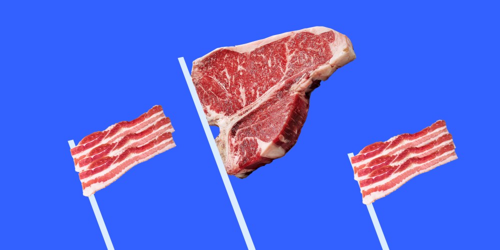 Photo illustration: Three flags made of steak and bacon strips.