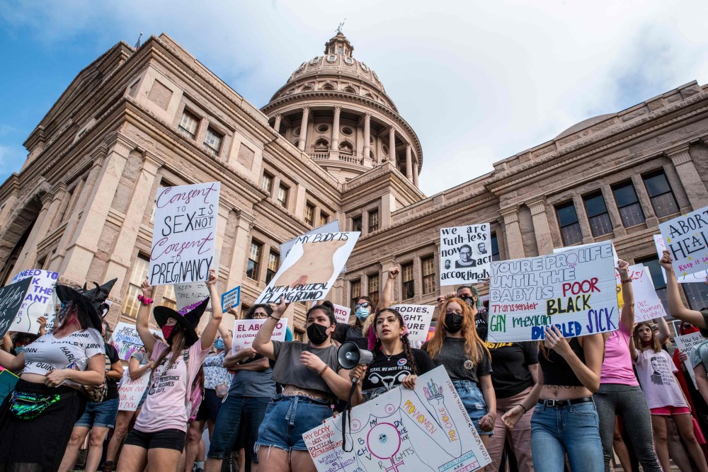 Protesters take part in march for abortion rights at the State Capitol in Austin, Texas, on Oct .3, 2021.