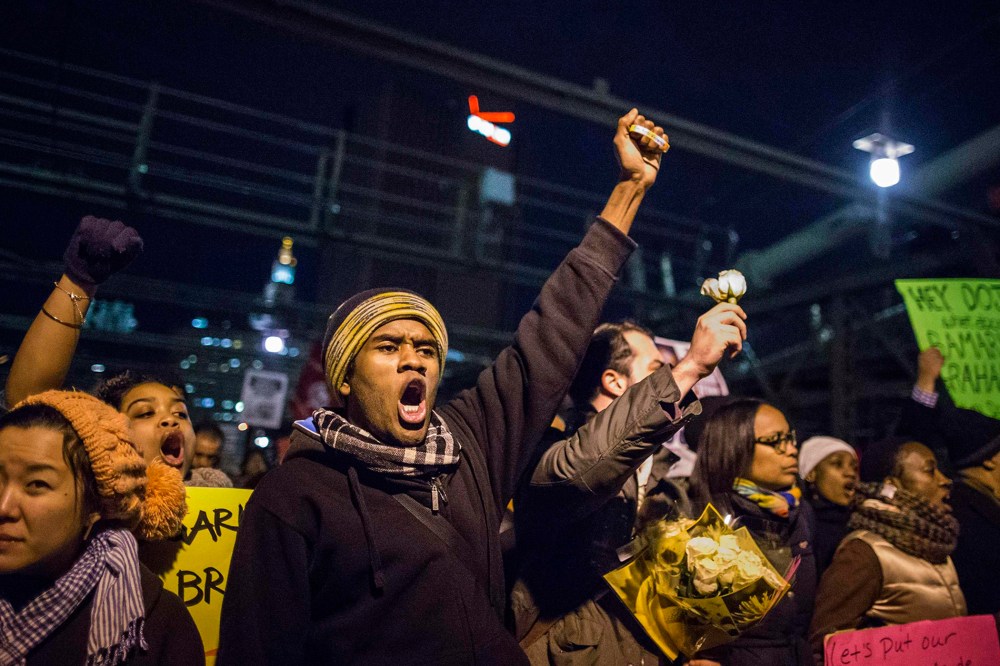 Protesters, demanding justice for Eric Garner, cross the Brooklyn Bridge in New York City, on Dec. 4, 2014.