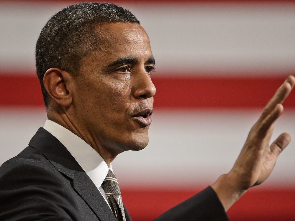 US President Barack Obama gestures as he speaks at Hyde Park Academy in Chicago, Illinois, USA, 15 February 2013. Obama is calling for a raise to the federal minimum wage, job training and marriage for low income families on his post State of the...