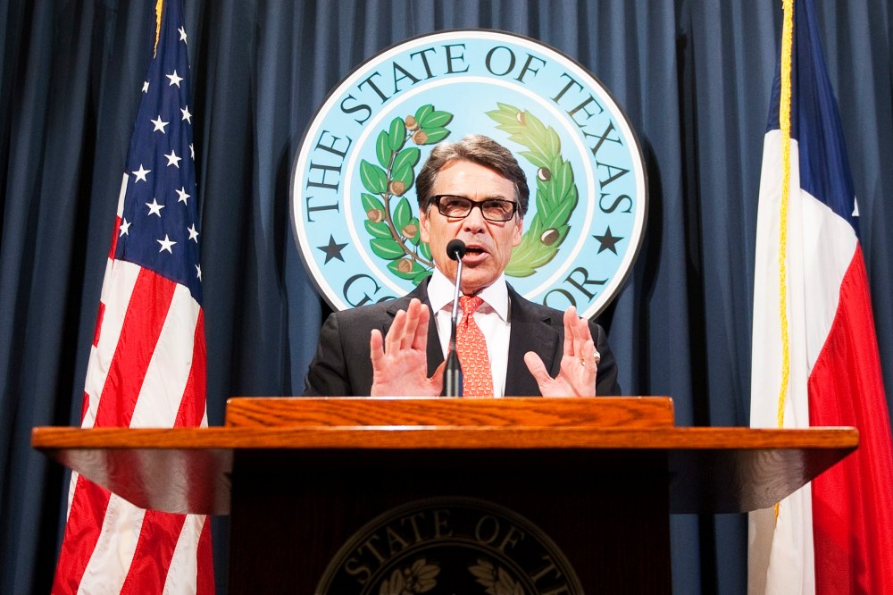 Texas Governor Rick Perry makes a statement regarding his grand jury indictment on charges of abuse of power at the Texas state capitol, August 16, 2014.