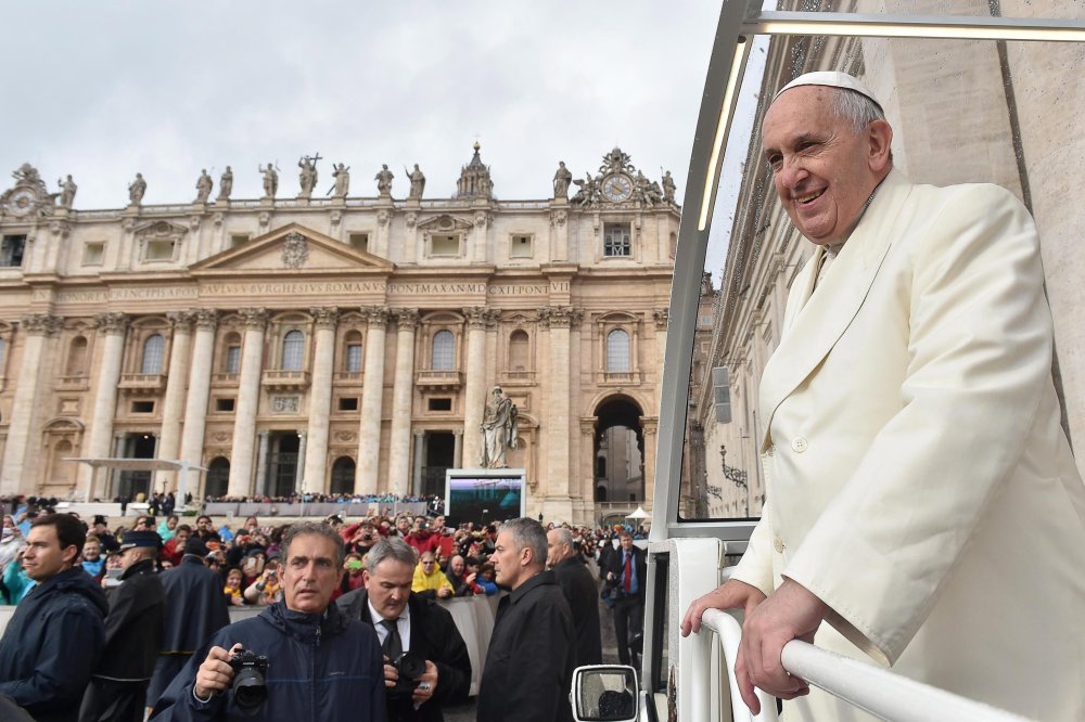 Pope Francis arrives to his Wednesday's General Audience in St. Peter's Square, Vatican City on Dec. 3, 2014. (L'OSSERVATORE ROMANO/EPA)