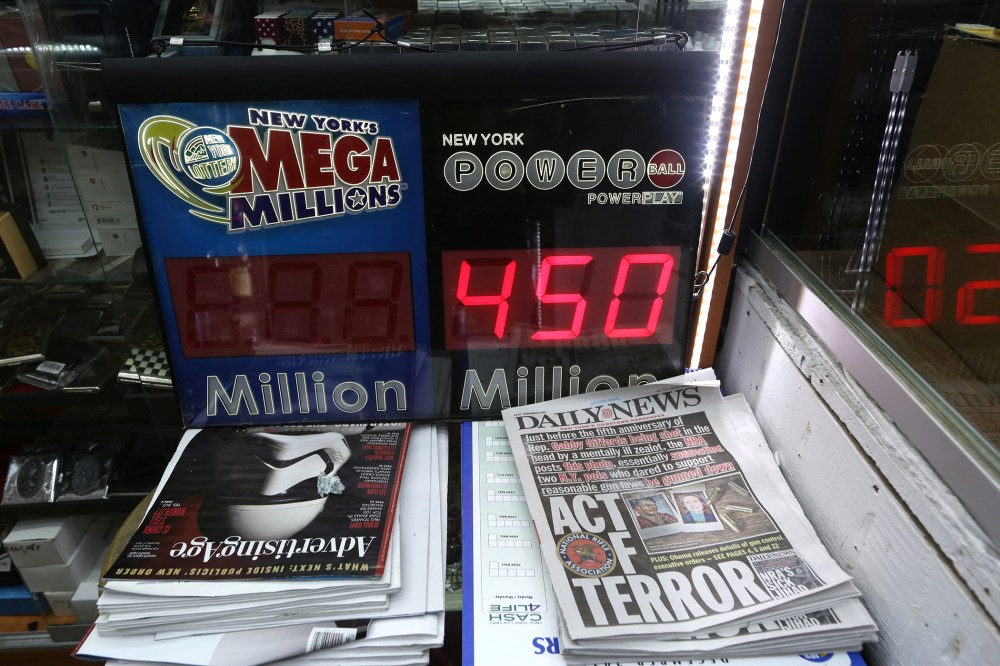 A sign showing the jackpot for the next Powerball draw in New York, N.Y., on Jan 5, 2016. (Photo by Andrew Gombert/EPA)