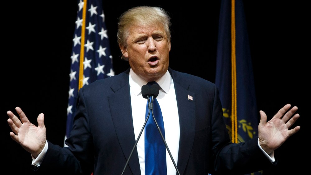 Republican presidential candidate Donald Trump gestures as he speaks during a rally at the Verizon Wireless Center in Manchester, N.H., on Feb. 8, 2016. (Photo by Justin Lane/EPA)