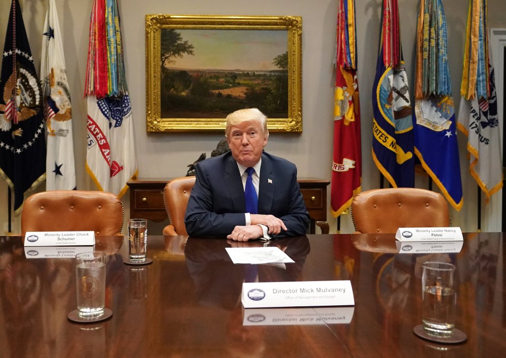 U.S. President Donald J. Trump speaks to the media during a meeting with congressional leadership in the Roosevelt Room at the White House, in Washington, D.C., November 28, 2017.