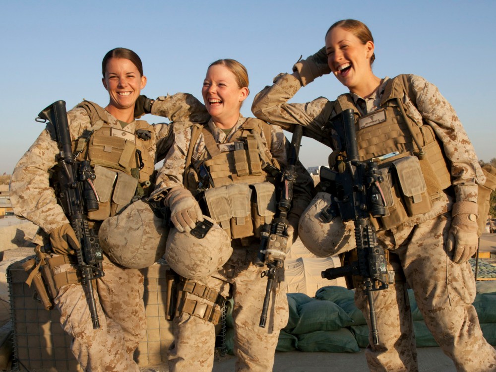 Sargent Sheena Adams and Lance Corporal Kristi Baker and Hospital Corpsman Shannon Crowley working with the FET (Female Engagement Team) 1st Battalion 8th Marines, Regimental Combat team II (Paula Bronstein/Getty Images)