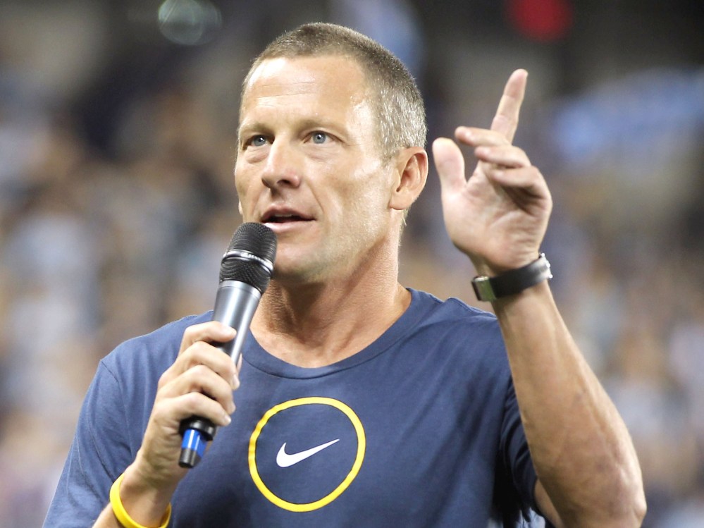 File Photo: Lance Armstrong speaks to the crowd prior to the innaugural game between the Chicago Fire and Sporting Kansas City at LiveStrong Sporting Park on June 9, 2011 in Kansas City, Kansas.  (Photo by Jamie Squire/Getty Images/File)