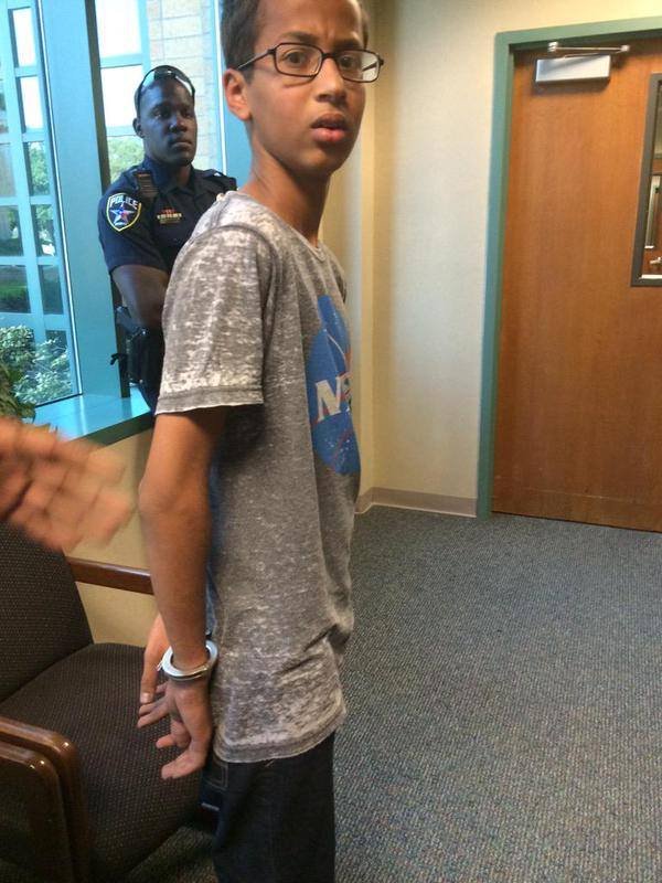 Ahmed Mohamed, A 14-year-old North Texas student, appears in handcuffs, after his arrest on charges of making a "hoax bomb."