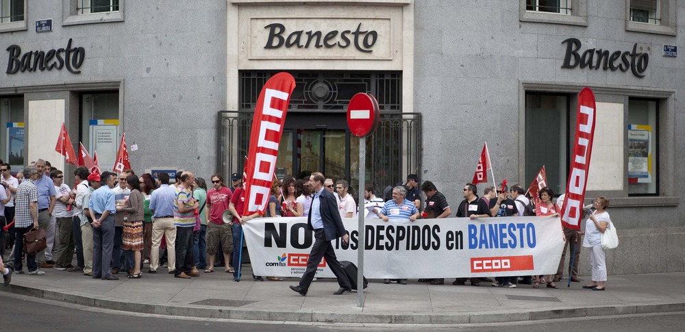 Spain's economic crisis includes protests like this one in Madrid on Friday, where people rallied against layoffs at Banesto bank.