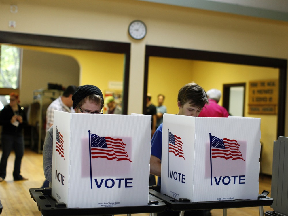 Voters cast their ballots in a recall election for the governor and lieutenant governor at the Wil-Mar Neighborhood Center June 5, 2012 in Madison, Wisconsin.