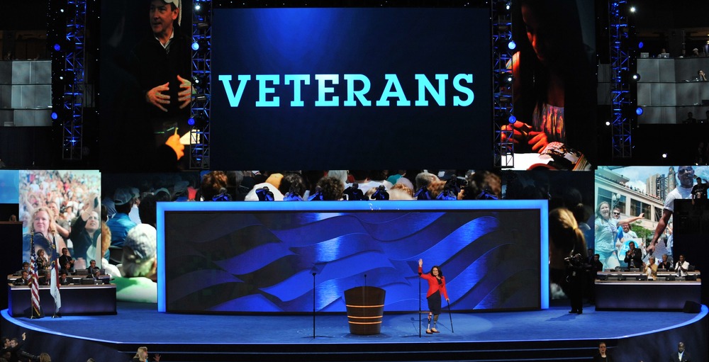 Former Assistant Secretary, U.S. Department of Veterans Affairs Tammy Duckworth waves to the audience at the Time Warner Cable Arena in Charlotte, North Carolina, on September 4, 2012 on the first day of the Democratic National Convention.