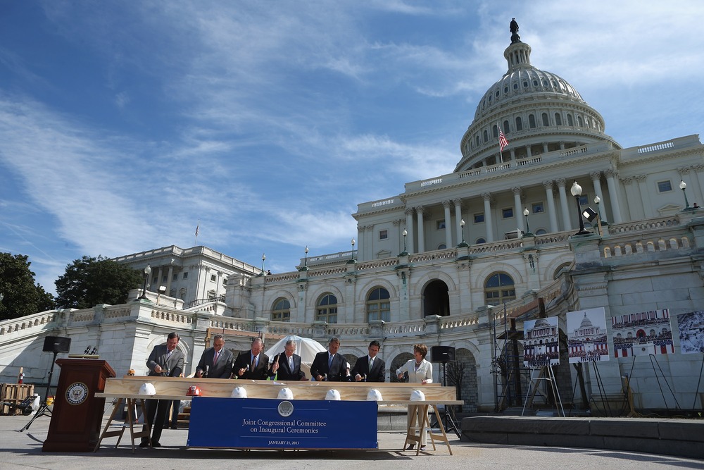 (L-R) Architect of the Capitol Stephen Ayers, Sen. Charles Schumer, Sen. Lamar Alexander, Senate Majority Leader Harry Reid, Speaker of the House John Boehner, House Majority Leader Eric Cantor, and House Minority Leader Nancy Pelosi swing their...