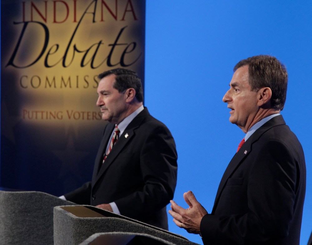 Candidates for Indiana's U.S. Senate seat Democrat Joe Donnelly, left, and Republican Richard, Mourdock participate in a debate in Indianapolis, Monday, Oct. 15, 2012 (Photo: AP/Michael Conroy)