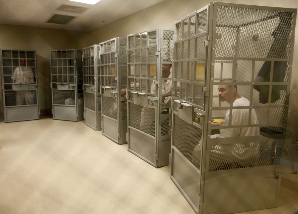 Administrative segregation prisoners take part in a group therapy session at San Quentin state prison in San Quentin, California, June 8, 2012. (REUTERS/Lucy Nicholson)