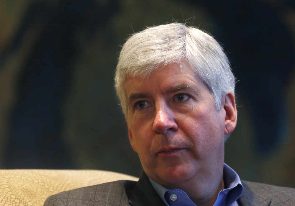 Michigan Gov. Rick Snyder is interviewed in his office in Lansing, Mich., Monday, Dec. 17, 2012. (AP Photo/Carlos Osorio)