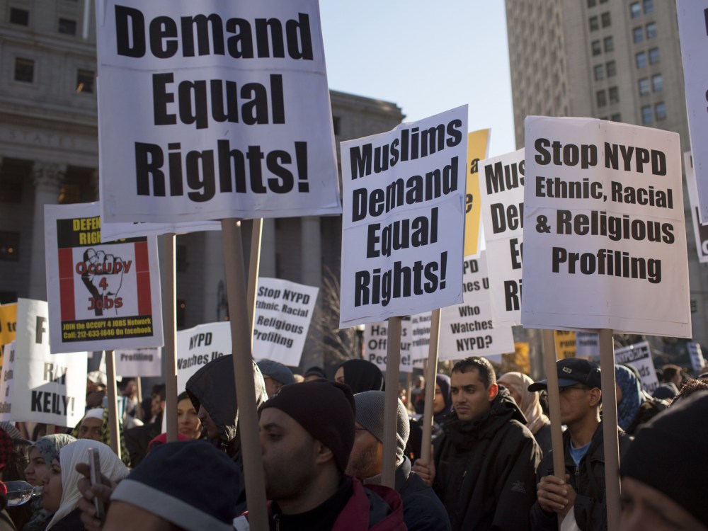 File Photo: Muslim-Americans protest the continued infiltration and monitoring of local Muslims and Muslim community organizations by the New York Police Department and the CIA November 18, 2011 in Foley Square, in the Manhattan borough of New York.  ...