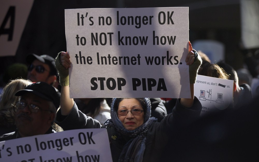 Protesters demonstrate against the proposed Stop Online Piracy Act (SOPA) and Protect IP Act (PIPA) outside the offices of U.S. Sen. Charles Schumer (D-NY) and U.S. Sen. Kirsten Gillibrand (D-NY) on January 18, 2012 in New York City. The controversial...