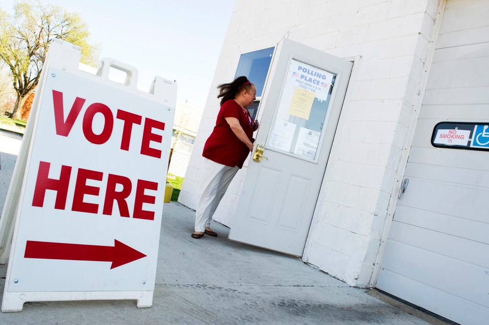 A Voter enters the fire station polling place in Magnolia, Illinois, March 20, 2012.