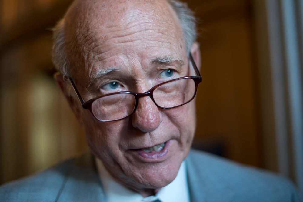 Sen. Pat Roberts, R-Kan., talks with reporters before a Senate luncheon at the Capitol in 2012.