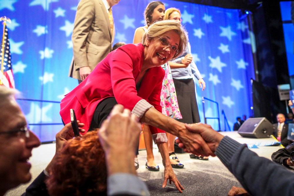 Elizabeth Warren greets the crowd after winning the nomination during the 2012 Massachusetts Democratic Endorsing Convention in Springfield, Mass.