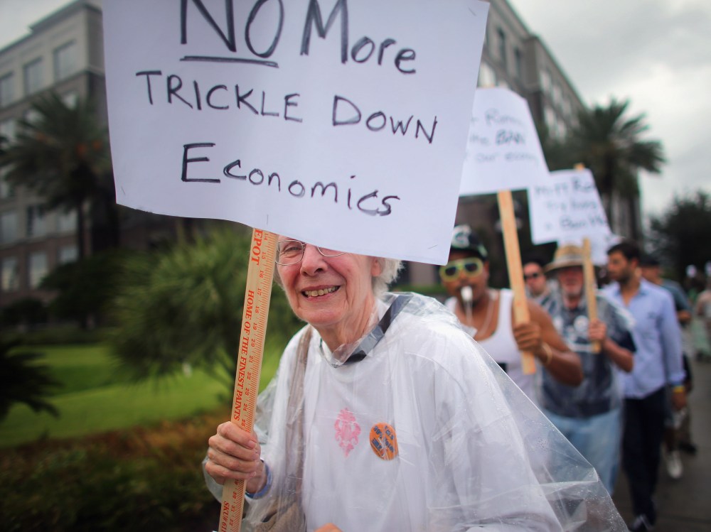 File Photo: Protesters demonstrate in front of the Bain Capital owned Bloomin' Brand Corporate Headquarters before the start of the Republican National Convention at the Tampa Bay Times Forum on August 27, 2012 in Tampa, Florida. Bain Capital was led...