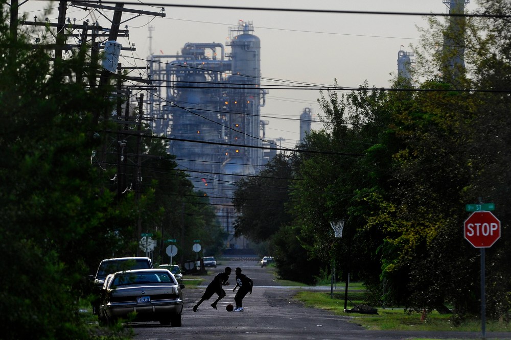 Oil facilities loom in the background of  Port Arthur, Texas, which is the end of the line for oil that would travel through the proposed Keystone XL Pipeline.