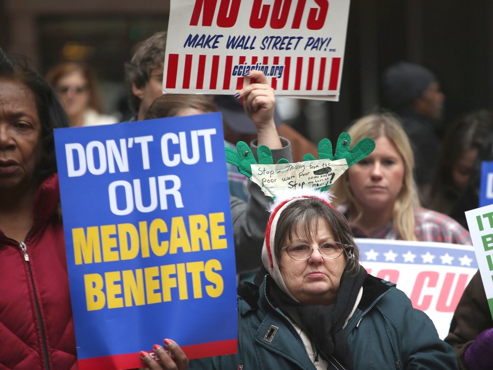 Protestors call for an increase of taxes on the wealthy and voice opposition to cuts in Social Security, Medicare, and Medicaid during a demonstration in the Federal Building Plaza on December 6, 2012 in Chicago, Illinois. About 300 protestors...