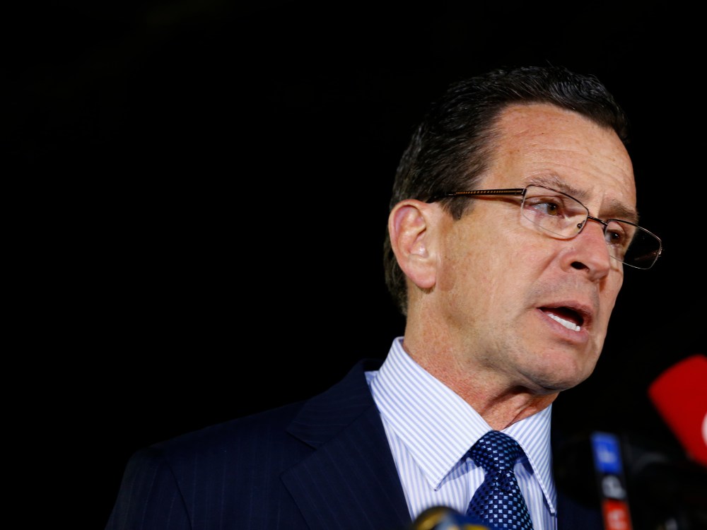 NEWTOWN, CT - DECEMBER 14: Connecticut Gov. Dan Malloy briefs the media on the elementary school shootings during a press conference at Treadwell Memorial Park on December 14, 2012 in Newtown, Connecticut. (Photo by Jared Wickerham/Getty Images)