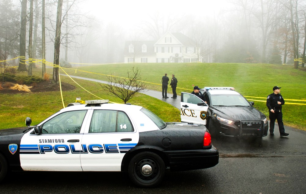 Police outside the home of Nancy Lanza, Dec. 18, 2012.