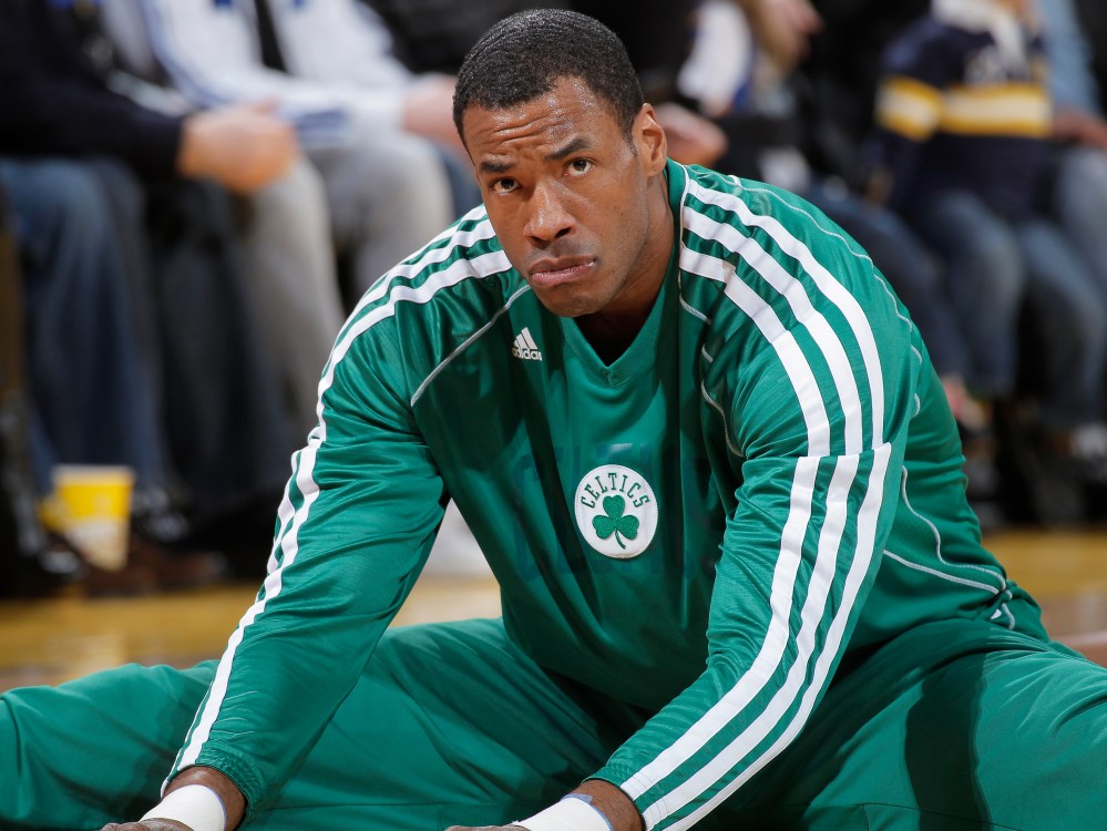 Jason Collins #98 of the Boston Celtics warms up in a game against the Golden State Warriors on December 29, 2012 at Oracle Arena in Oakland, California. (Photo by Rocky Widner/NBAE via Getty Images)