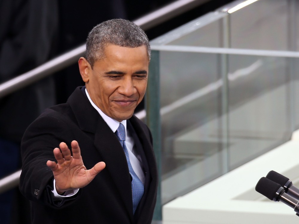 U.S. President Barack Obama waves before speaking during the presidential inauguration on the West Front of the U.S. Capitol January 21, 2013 in Washington, DC.   Barack Obama was re-elected for a second term as President of the United States.  (Photo...
