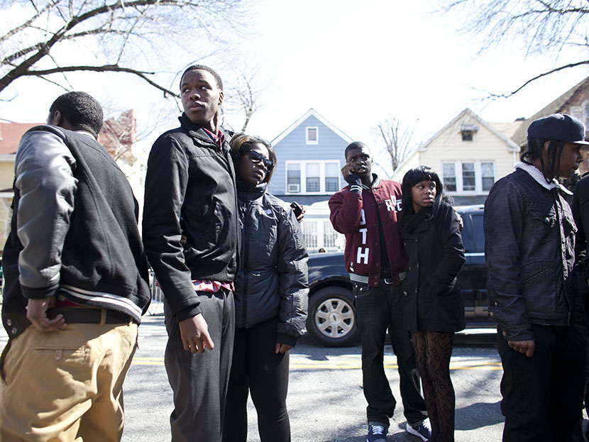 Friends and family of Kimani Gray, 16, watch as his casket is carried out after a funeral service on March 23, 2013 in the Brooklyn borough of New York City. Kimani Gray was shot and killed by New York police officers for allegedly pointing a gun at...