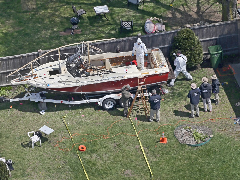 Aerial view of the boat where one of the Boston Marathon bombing suspects was found in Watertown, Mass. (Photo by David L Ryan/The Boston Globe via Getty Images)