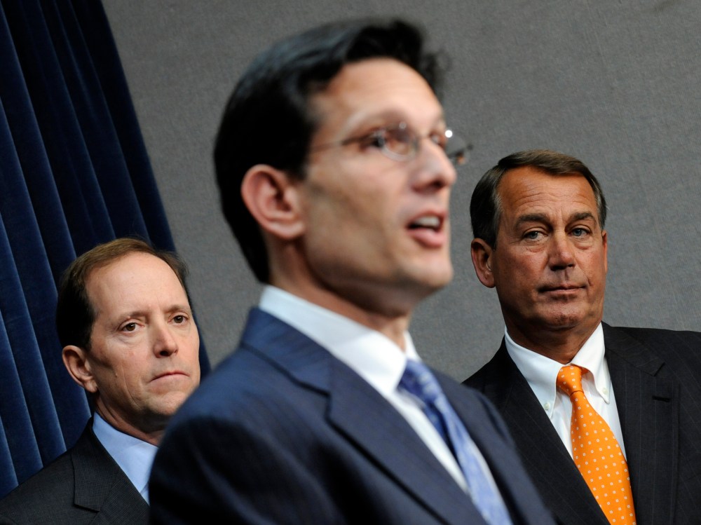 House Speaker John Boehner, right, and Rep. Dave Camp, left, listen as House Majority Leader Eric Cantor, speaks on Capitol Hill in Washington, D.C., January 21, 2009.