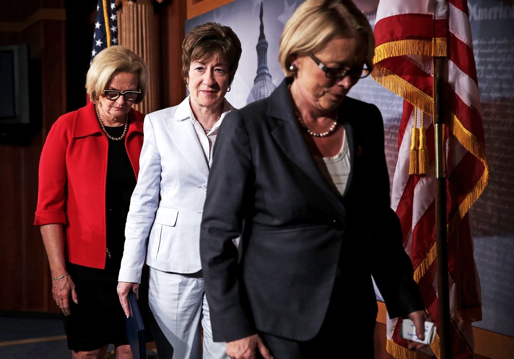 U.S. Sen. Claire McCaskill, Sen. Susan Collins, and Rep. Niki Tsongas leave after a news conference on Capitol Hill in Washington, May 23, 2013.
