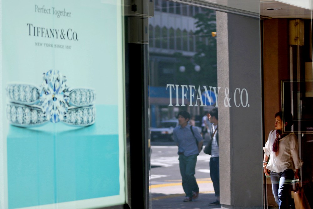 A pedestrian walks past a Tiffany & Co. advertisement in Sapporo, Hokkaido Prefecture, Japan, on June 9, 2013.
