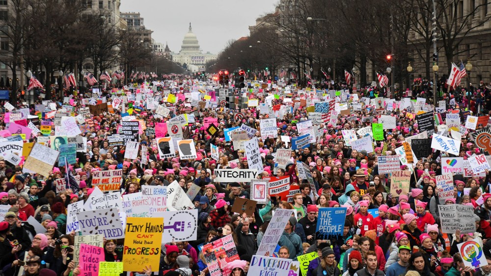 Image: Hundreds of thousands march down Pennsylvania Avenue during the Women's March in Washington