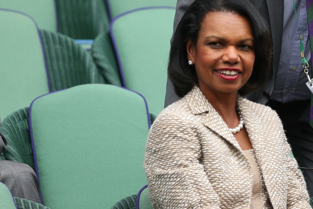 Condoleezza Rice watches the gentlemen's singles match on day one of the Wimbledon Lawn Tennis Championships on June 24, 2013 in London, England.