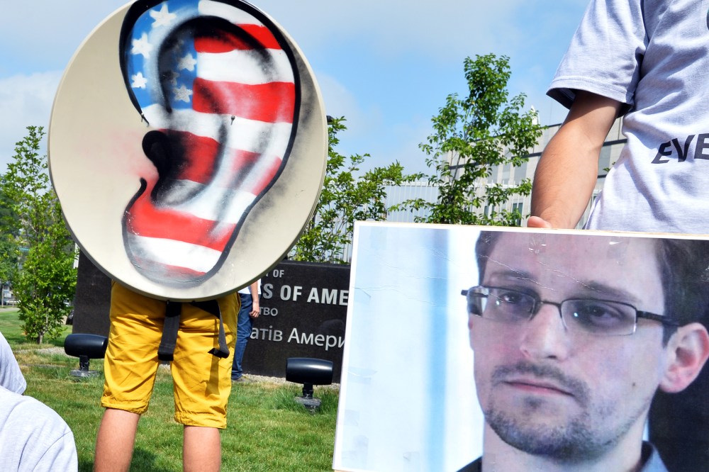 Ukrainian Internet Party activists hold a "tap the phone and internet lines" protest, June 27, 2013.