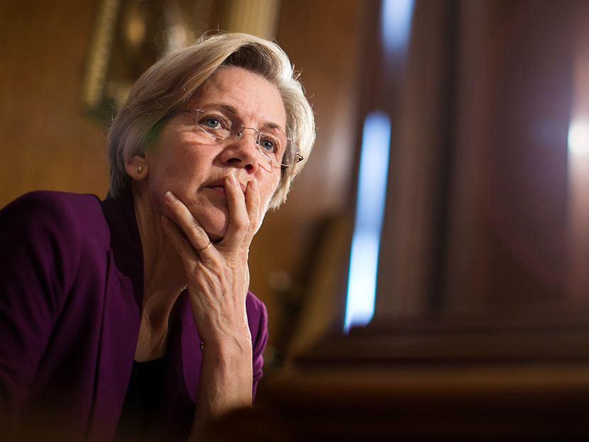 U.S. Sen. Elizabeth Warren (D-MA) listens to testimony from witnesses during a Senate Banking, Housing and Urban Affairs Committee hearing on "Mitigating Systemic Risk Through Wall Street Reforms," on Capitol Hill, July 11, 2013 in Washington, DC.  ...
